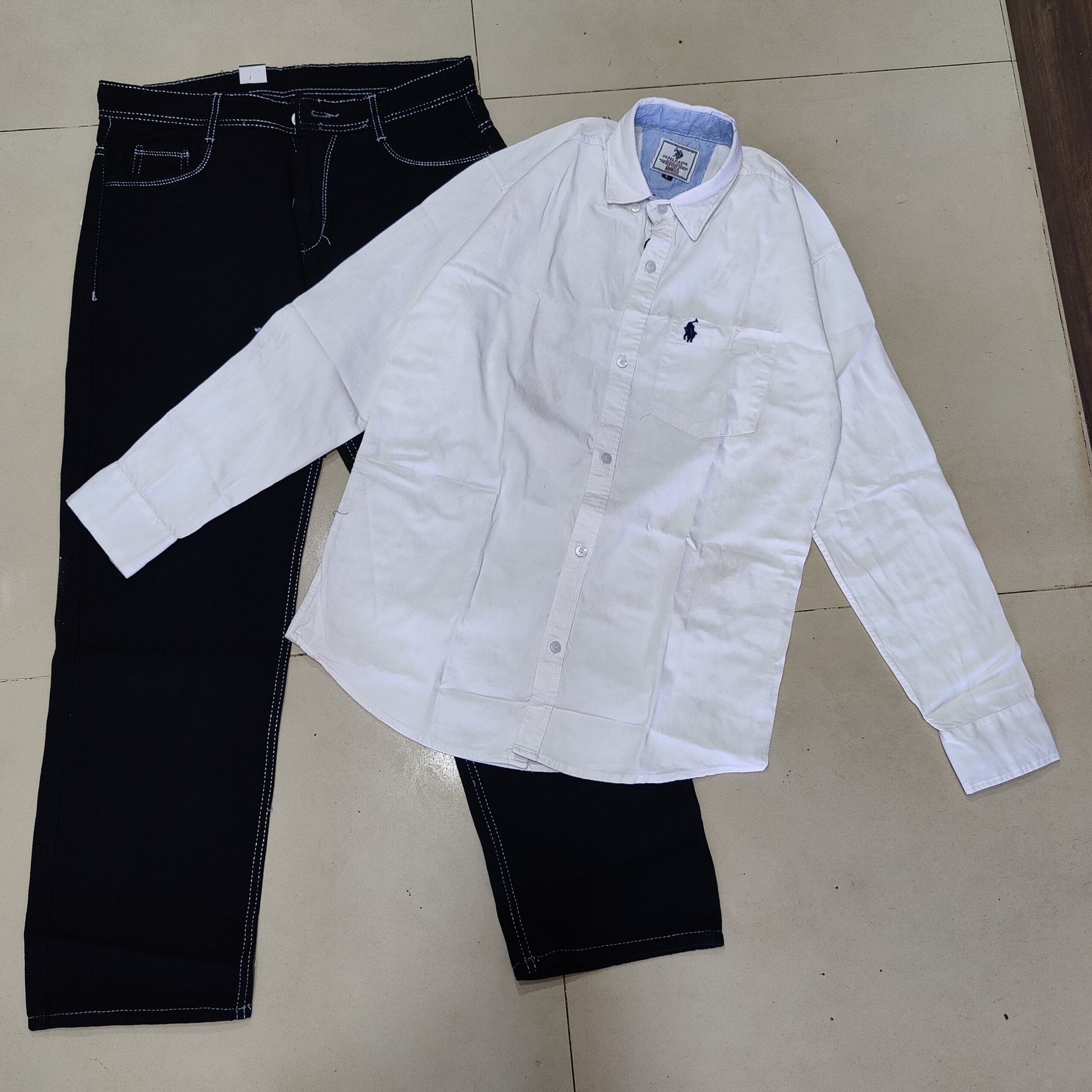 2026/04/1000096432-scaled.jpg Plain white Shirt and black jeans momfit combo for men's - Image 1