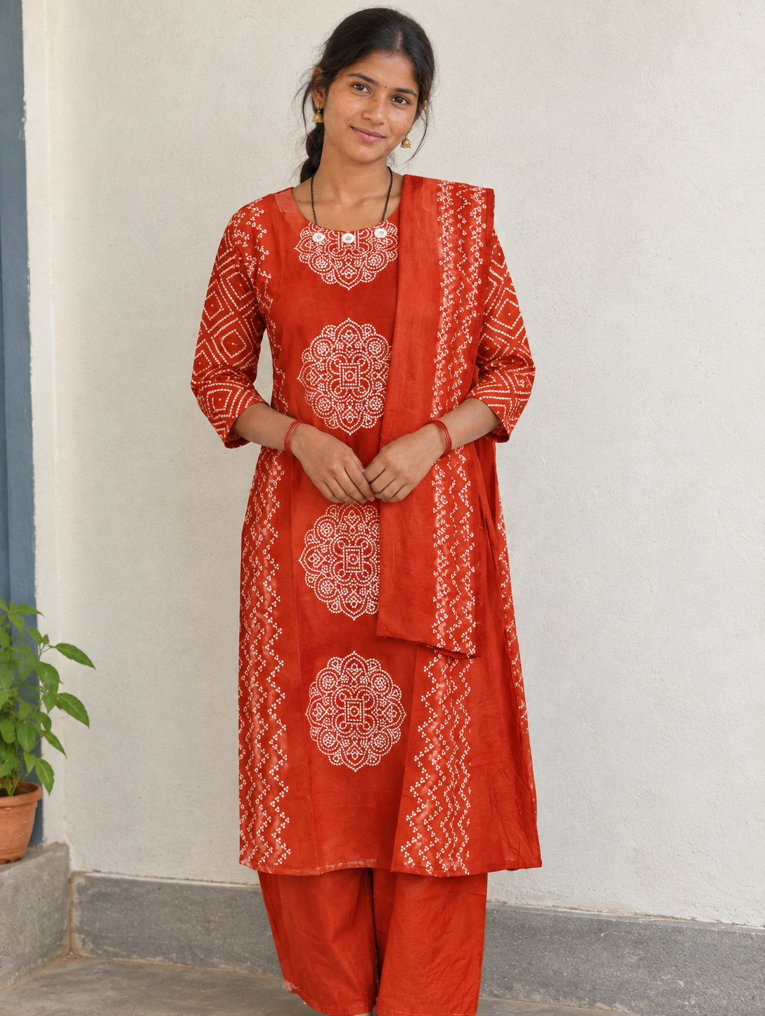2026/09/1000002458-1.png Women’s Rust Printed Kurta Pant Dupatta Set - Image 1